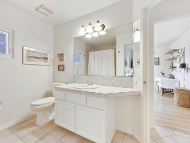 This perfectly placed adobe style home is right at the steps of on Tiara Rado Golf Course in Colorado - for sale on GolfHomes.com, golf home, golf lot