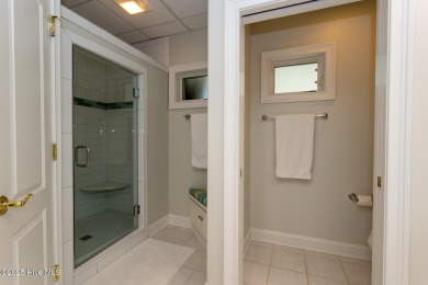 Experience the pinnacle of lakefront living in this immaculate on Beacon Ridge Golf and Country Club in North Carolina - for sale on GolfHomes.com, golf home, golf lot