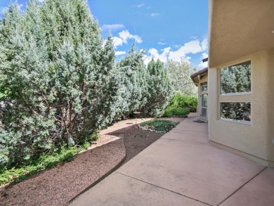 This perfectly placed adobe style home is right at the steps of on Tiara Rado Golf Course in Colorado - for sale on GolfHomes.com, golf home, golf lot