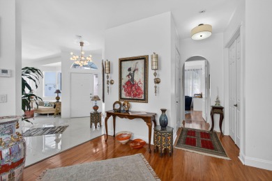 Rarely available single-story courtyard home perfectly situated on  in Florida - for sale on GolfHomes.com, golf home, golf lot
