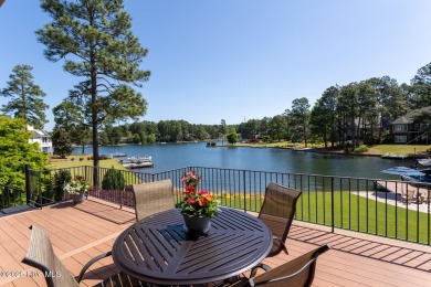 Experience the pinnacle of lakefront living in this immaculate on Beacon Ridge Golf and Country Club in North Carolina - for sale on GolfHomes.com, golf home, golf lot