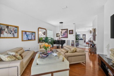 Rarely available single-story courtyard home perfectly situated on  in Florida - for sale on GolfHomes.com, golf home, golf lot