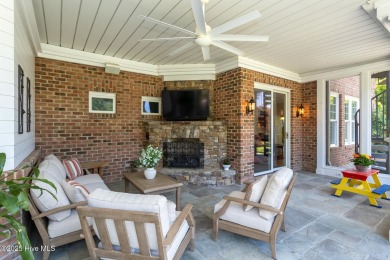 Experience the pinnacle of lakefront living in this immaculate on Beacon Ridge Golf and Country Club in North Carolina - for sale on GolfHomes.com, golf home, golf lot