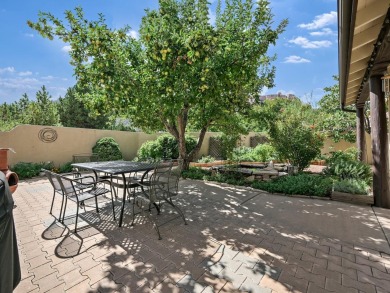This perfectly placed adobe style home is right at the steps of on Tiara Rado Golf Course in Colorado - for sale on GolfHomes.com, golf home, golf lot