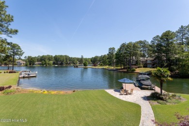 Experience the pinnacle of lakefront living in this immaculate on Beacon Ridge Golf and Country Club in North Carolina - for sale on GolfHomes.com, golf home, golf lot