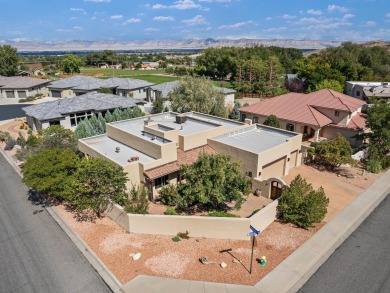 This perfectly placed adobe style home is right at the steps of on Tiara Rado Golf Course in Colorado - for sale on GolfHomes.com, golf home, golf lot