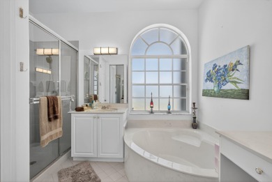 Rarely available single-story courtyard home perfectly situated on  in Florida - for sale on GolfHomes.com, golf home, golf lot
