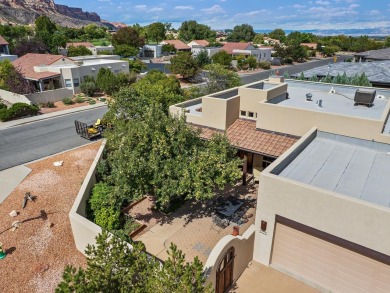 This perfectly placed adobe style home is right at the steps of on Tiara Rado Golf Course in Colorado - for sale on GolfHomes.com, golf home, golf lot