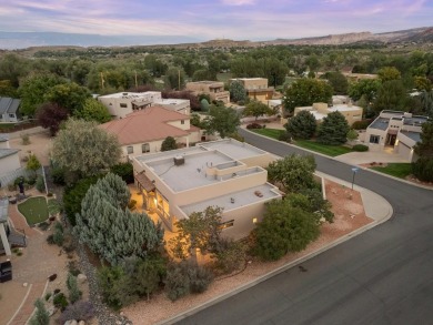 This perfectly placed adobe style home is right at the steps of on Tiara Rado Golf Course in Colorado - for sale on GolfHomes.com, golf home, golf lot