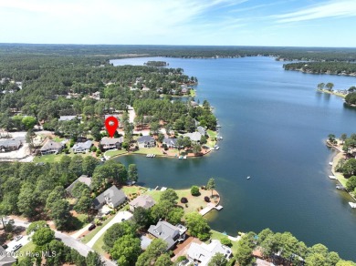 Experience the pinnacle of lakefront living in this immaculate on Beacon Ridge Golf and Country Club in North Carolina - for sale on GolfHomes.com, golf home, golf lot