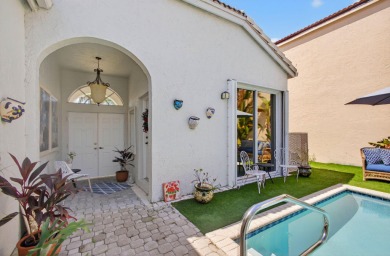 Rarely available single-story courtyard home perfectly situated on  in Florida - for sale on GolfHomes.com, golf home, golf lot