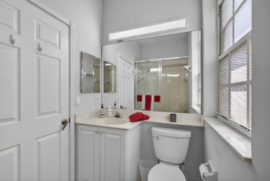 Rarely available single-story courtyard home perfectly situated on  in Florida - for sale on GolfHomes.com, golf home, golf lot
