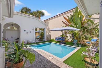Rarely available single-story courtyard home perfectly situated on  in Florida - for sale on GolfHomes.com, golf home, golf lot