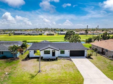 Modern Luxury Meets Beautiful Pond and Golf Course Views in This on Rotonda Golf and Country Club The Hills Course in Florida - for sale on GolfHomes.com, golf home, golf lot