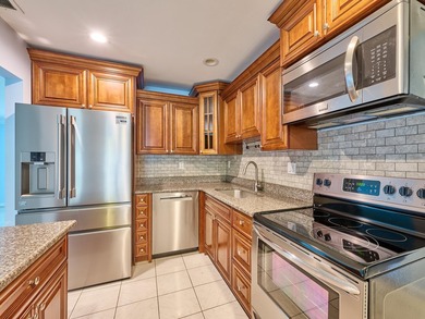 This is the largest 2/2/1 w/ the BONUS covered front porch on Leisureville Community Golf Course in Florida - for sale on GolfHomes.com, golf home, golf lot