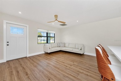 Modern Luxury Meets Beautiful Pond and Golf Course Views in This on Rotonda Golf and Country Club The Hills Course in Florida - for sale on GolfHomes.com, golf home, golf lot