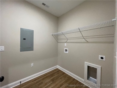 This beautiful three bedroom, two bathroom luxury condo in on Anderson Creek Golf Club in North Carolina - for sale on GolfHomes.com, golf home, golf lot