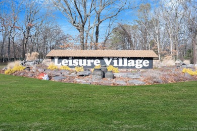 Welcome home to comfort, convenience and care-free living. A on Leisure Village Golf Course in New York - for sale on GolfHomes.com, golf home, golf lot