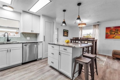 Under contract-accepting backup offers. Owner financing is on Pelican Pointe Golf and Country Club in Florida - for sale on GolfHomes.com, golf home, golf lot