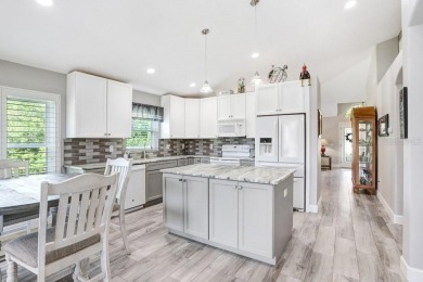 Experience Florida living at its finest in this stunning on Heritage Harbor Golf and Country Club in Florida - for sale on GolfHomes.com, golf home, golf lot