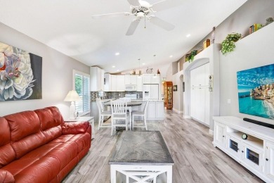 Experience Florida living at its finest in this stunning on Heritage Harbor Golf and Country Club in Florida - for sale on GolfHomes.com, golf home, golf lot