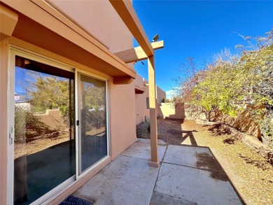 This charming Tierra Contenta home is just a stone's throw away on Santa Fe Country Club in New Mexico - for sale on GolfHomes.com, golf home, golf lot