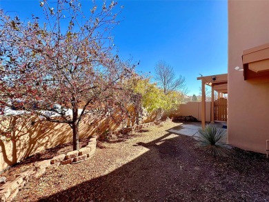 This charming Tierra Contenta home is just a stone's throw away on Santa Fe Country Club in New Mexico - for sale on GolfHomes.com, golf home, golf lot