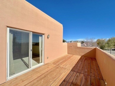 This charming Tierra Contenta home is just a stone's throw away on Santa Fe Country Club in New Mexico - for sale on GolfHomes.com, golf home, golf lot