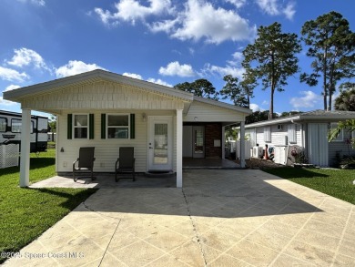 Welcome home! This quaint, custom built executive suite is on The Great Outdoors Golf and Country Club in Florida - for sale on GolfHomes.com, golf home, golf lot