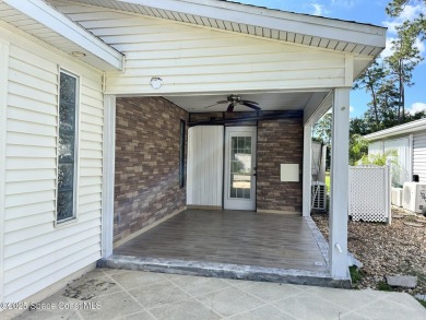 Welcome home! This quaint, custom built executive suite is on The Great Outdoors Golf and Country Club in Florida - for sale on GolfHomes.com, golf home, golf lot