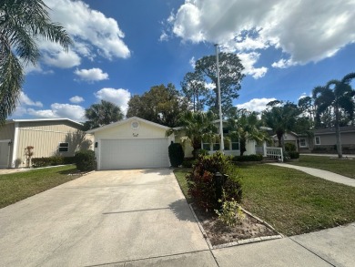 A well cared for 2 bedrooms, 2 bathrooms Palm Harbor home on the on Del Tura Golf and Country Club in Florida - for sale on GolfHomes.com, golf home, golf lot
