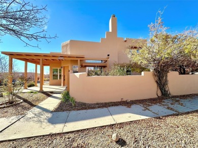 This charming Tierra Contenta home is just a stone's throw away on Santa Fe Country Club in New Mexico - for sale on GolfHomes.com, golf home, golf lot