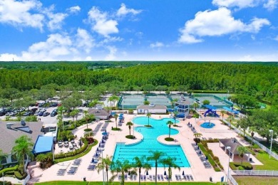 Experience Florida living at its finest in this stunning on Heritage Harbor Golf and Country Club in Florida - for sale on GolfHomes.com, golf home, golf lot