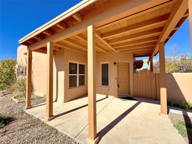 This charming Tierra Contenta home is just a stone's throw away on Santa Fe Country Club in New Mexico - for sale on GolfHomes.com, golf home, golf lot