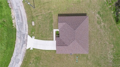 Crafted by an award-winning builder, this Citrus Springs home on Citrus Springs Country Club in Florida - for sale on GolfHomes.com, golf home, golf lot