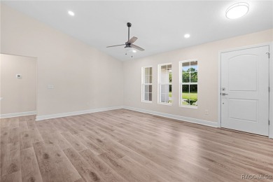 Crafted by an award-winning builder, this Citrus Springs home on Citrus Springs Country Club in Florida - for sale on GolfHomes.com, golf home, golf lot