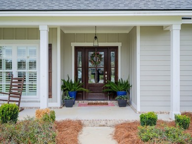 Welcome to your dream home in Kinderlou, where resort-style on Kinderlou Forest Golf Club in Georgia - for sale on GolfHomes.com, golf home, golf lot