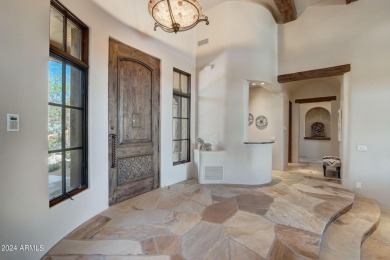 This high-quality custom home with sunset views in guard-gated on Mirabel Golf Club in Arizona - for sale on GolfHomes.com, golf home, golf lot