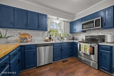 Charming 4-bedroom, 3-bath home located in the heart of on Jacksonville Country Club in North Carolina - for sale on GolfHomes.com, golf home, golf lot