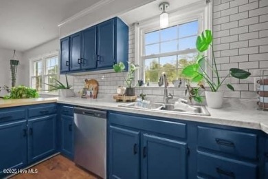 Charming 4-bedroom, 3-bath home located in the heart of on Jacksonville Country Club in North Carolina - for sale on GolfHomes.com, golf home, golf lot