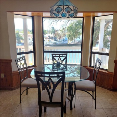 This Key West style Elevated home did not flood during hurricane on Gulf Harbors Golf Course in Florida - for sale on GolfHomes.com, golf home, golf lot