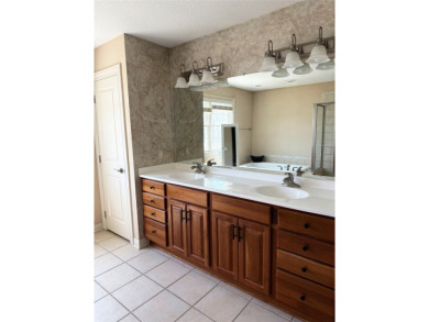 Luxury Living in Glen Oaks - Elegant 4BR Home in Gated Community on Glen Oaks Country Club in Iowa - for sale on GolfHomes.com, golf home, golf lot