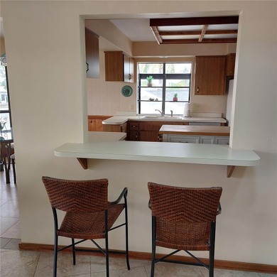 This Key West style Elevated home did not flood during hurricane on Gulf Harbors Golf Course in Florida - for sale on GolfHomes.com, golf home, golf lot