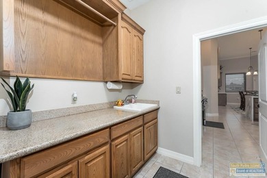 Experience refined lakefront living in this beautifully on South Padre Island Golf Club in Texas - for sale on GolfHomes.com, golf home, golf lot