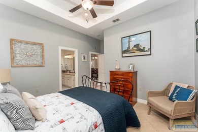 Experience refined lakefront living in this beautifully on South Padre Island Golf Club in Texas - for sale on GolfHomes.com, golf home, golf lot