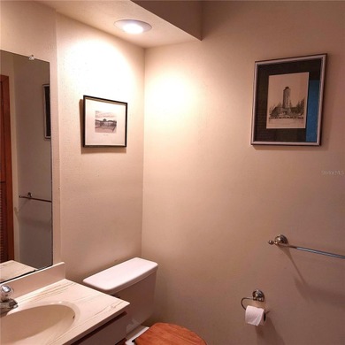 This Key West style Elevated home did not flood during hurricane on Gulf Harbors Golf Course in Florida - for sale on GolfHomes.com, golf home, golf lot