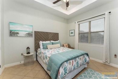 Experience refined lakefront living in this beautifully on South Padre Island Golf Club in Texas - for sale on GolfHomes.com, golf home, golf lot