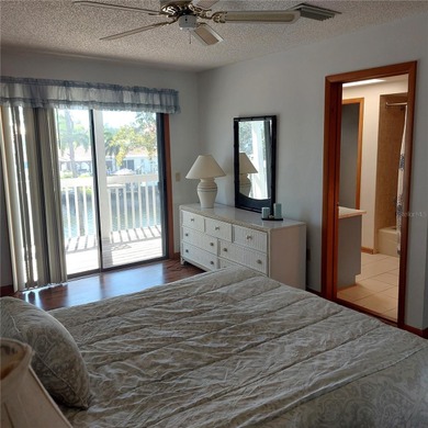 This Key West style Elevated home did not flood during hurricane on Gulf Harbors Golf Course in Florida - for sale on GolfHomes.com, golf home, golf lot