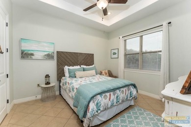 Experience refined lakefront living in this beautifully on South Padre Island Golf Club in Texas - for sale on GolfHomes.com, golf home, golf lot