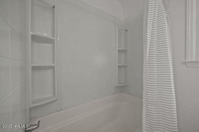 Charming 4-bedroom, 3-bath home located in the heart of on Jacksonville Country Club in North Carolina - for sale on GolfHomes.com, golf home, golf lot
